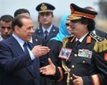 القذافي ينصح الإيطاليين بإلغاء الأحزاب السياسية‏!‏‏.‏ويشبه المرأة العربية بـ قطعة الأثاث