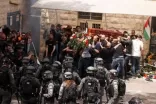 البيت الأبيض: صور جنازة صحفية الجزيرة القتيلة “مزعجة”